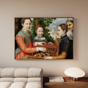 May include: A framed wall art print depicting a Renaissance-style painting of three individuals playing a game of chess at a table, with a fourth person standing in the background, all dressed in ornate period clothing with detailed textures.