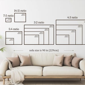 May include: A wall art size guide displaying various rectangular frame ratios including 7:5, 14:11, 5:4, 3:2, and 4:3 with specific dimensions in inches and centimeters. The graphic is positioned above a beige sofa measuring 90 inches wide.