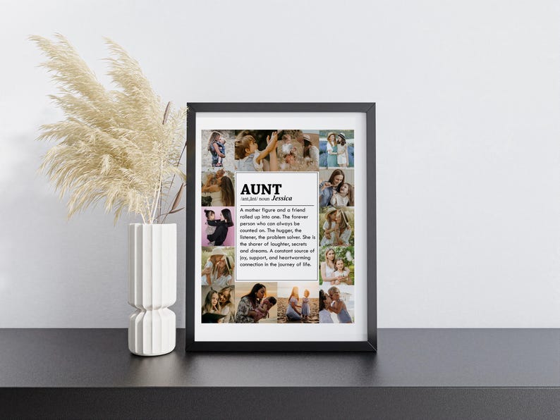 May include: A black framed collage with a white background featuring a photo montage of a woman with her family. The text "AUNT Jessica" is printed in bold black letters with a definition of the word "aunt" below.