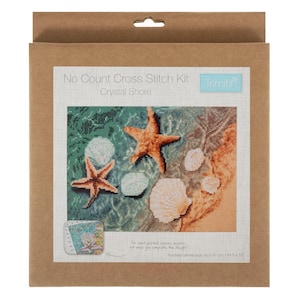 May include: A cross-stitch kit named "Crystal Shore" depicting a beach scene with starfish and seashells. The kit includes pre-printed canvas and the finished canvas size is 42 x 31 cm (approx. 16.5 x 12 inches).