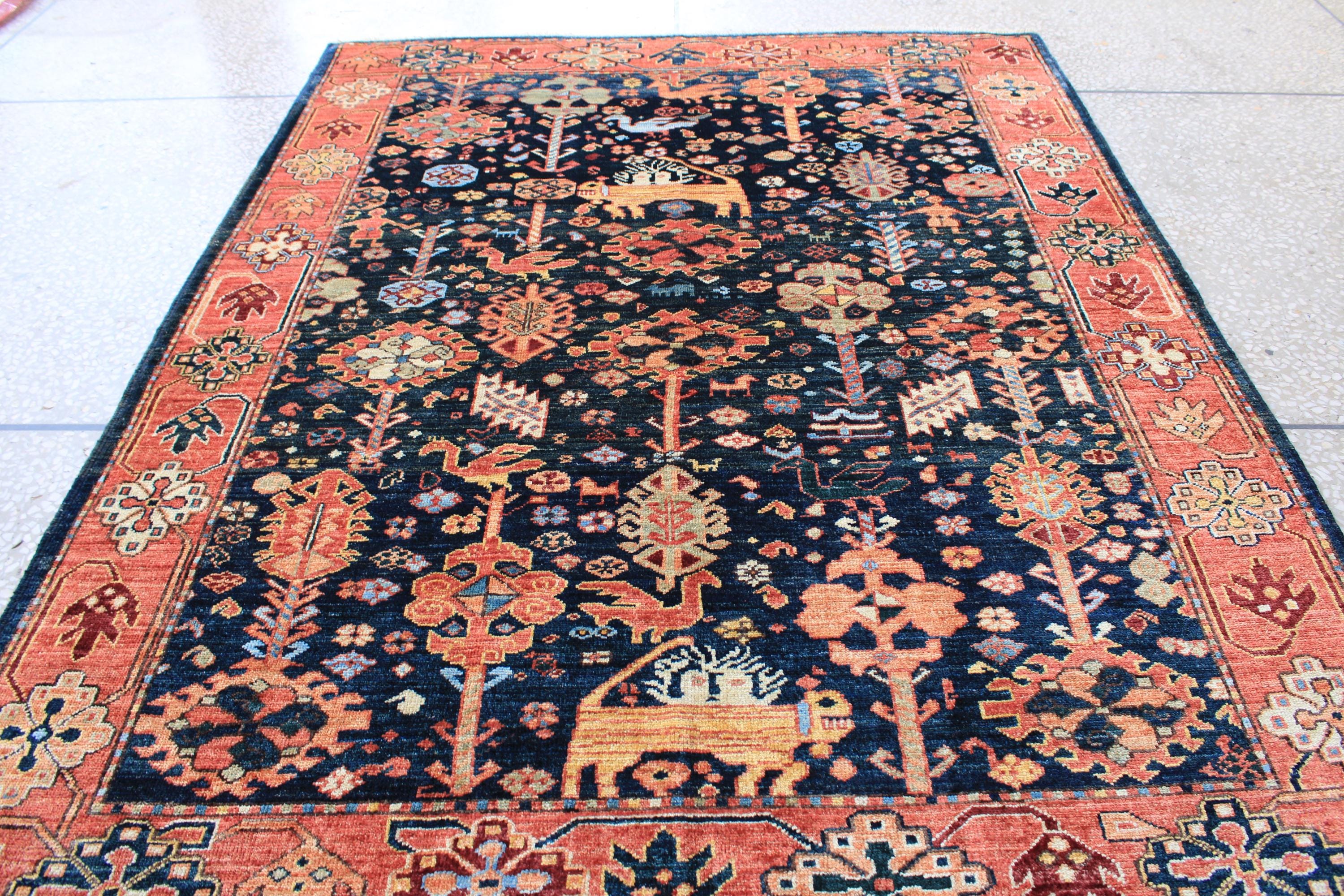 ハンドメイドのアフガニスタンウールラグ：5 x 7フィートの赤青