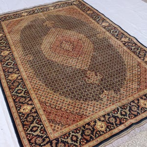 Handmade Afghan Turkmen Wool Rug: 7x10 ft Vintage Oriental Rug
