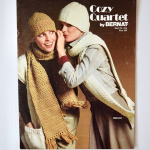 May include: A vintage knitting pattern booklet titled "Cozy Quartet by Bernat" with a brown background and a photo of two women wearing crocheted hats and scarves. The book number is 244 and the price is 50 pence.
