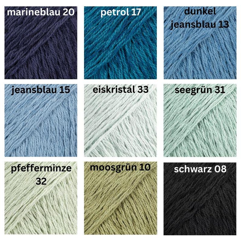 May include: Nine skeins of yarn in various colors, including navy blue, teal, light blue, and black. Each skein is labeled with a color name and number. The yarn appears to be a soft, textured material, suitable for knitting or crochet projects.