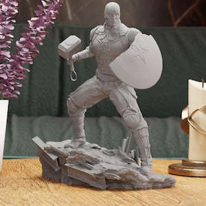 a statue of a man holding a hammer on a table
