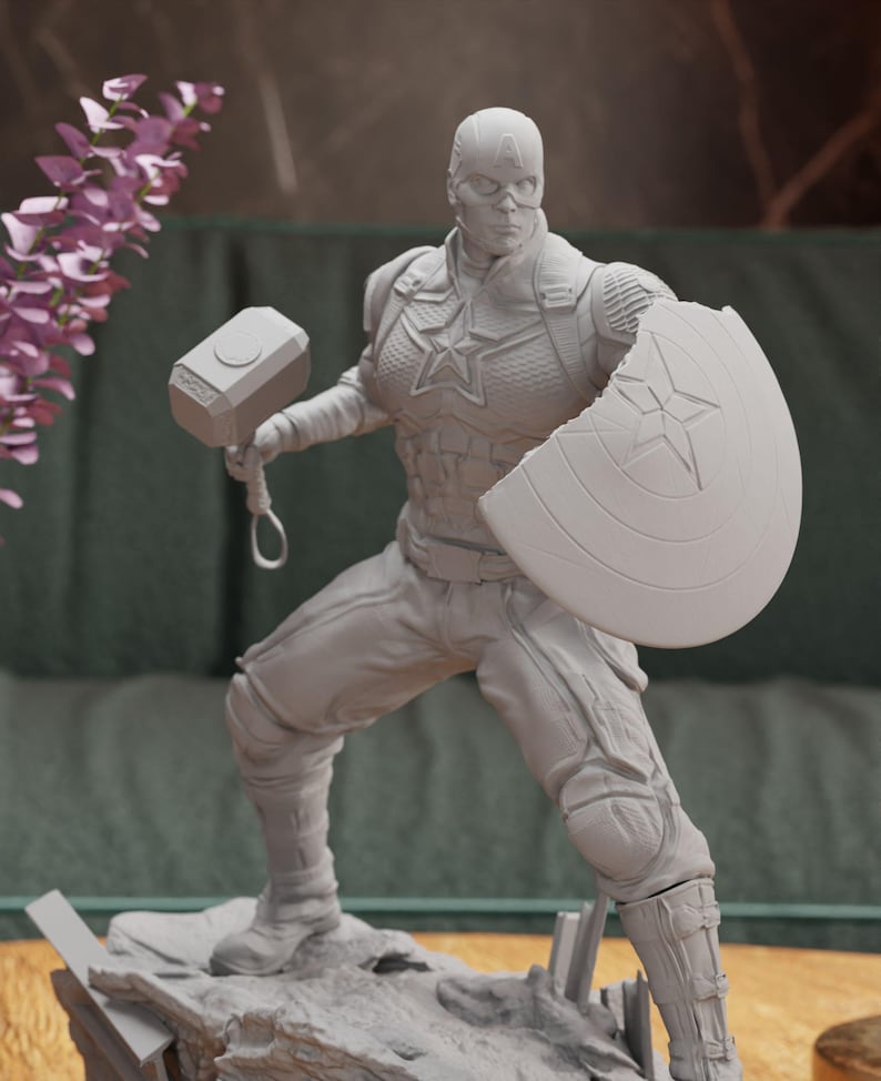 a statue of a man with a hammer and shield