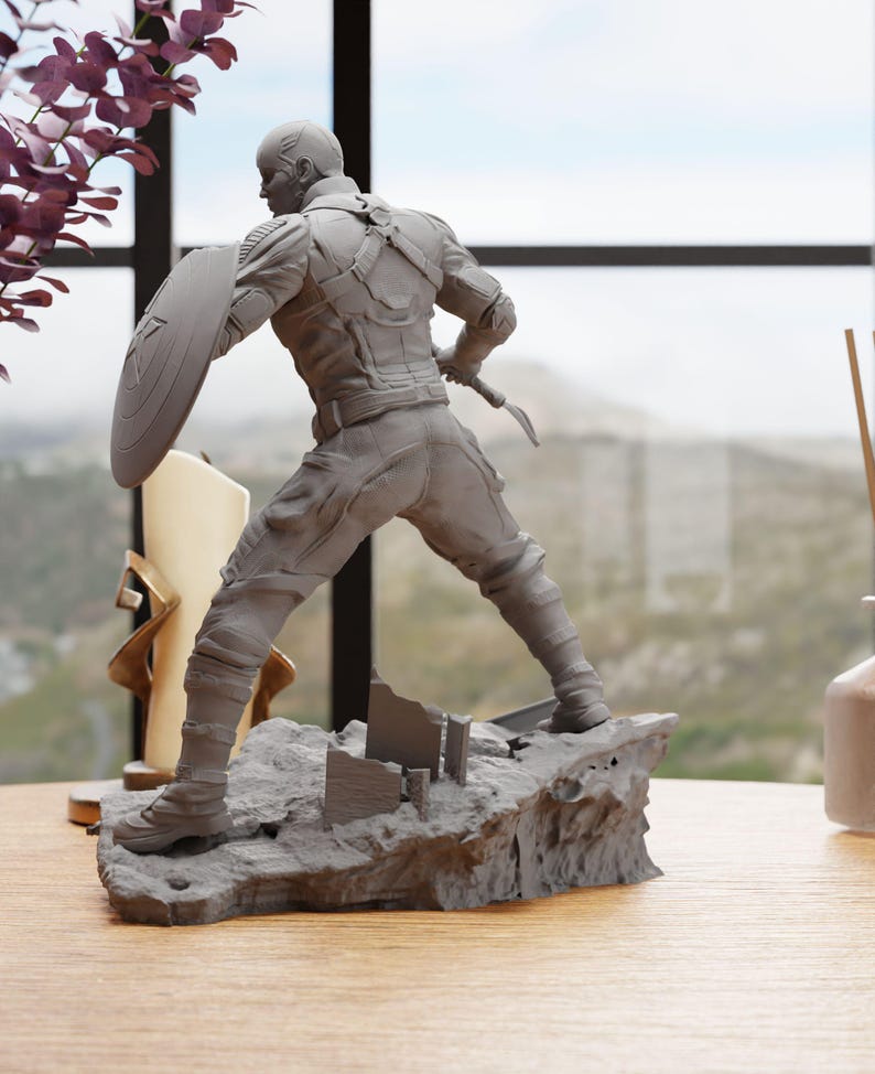a statue of a man holding a shield on a table