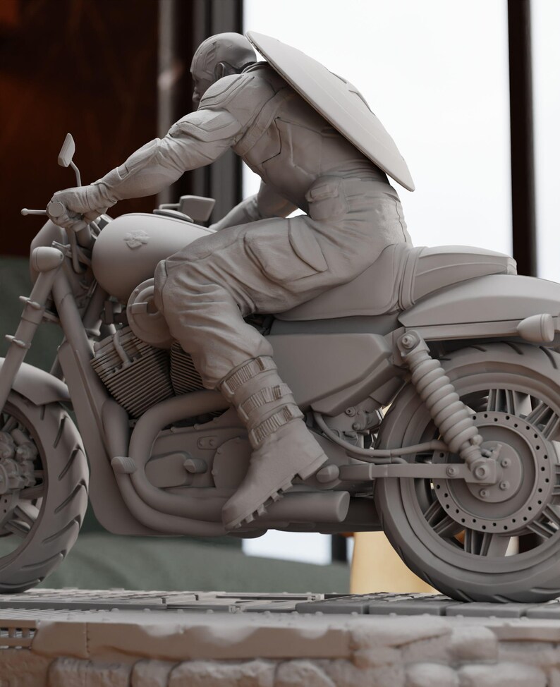 a statue of a man riding a motorcycle