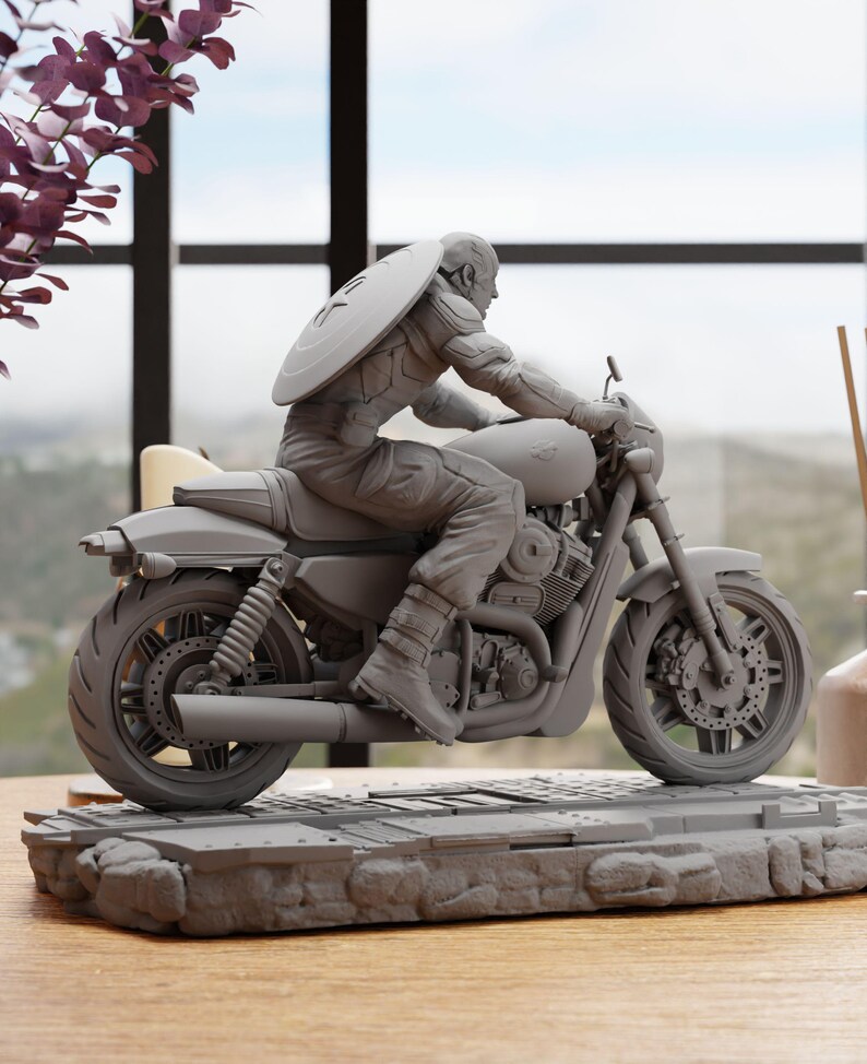 a statue of a man riding a motorcycle