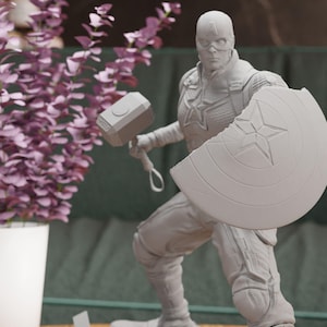 a statue of a man holding a hammer