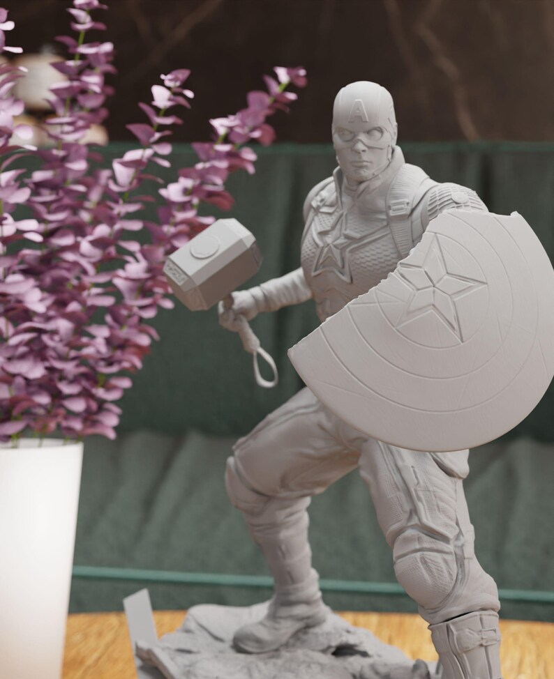 a statue of a man holding a hammer