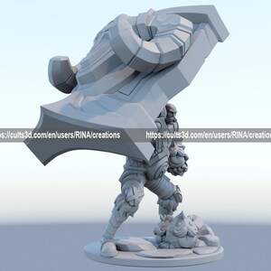 a white statue of a man holding a giant object