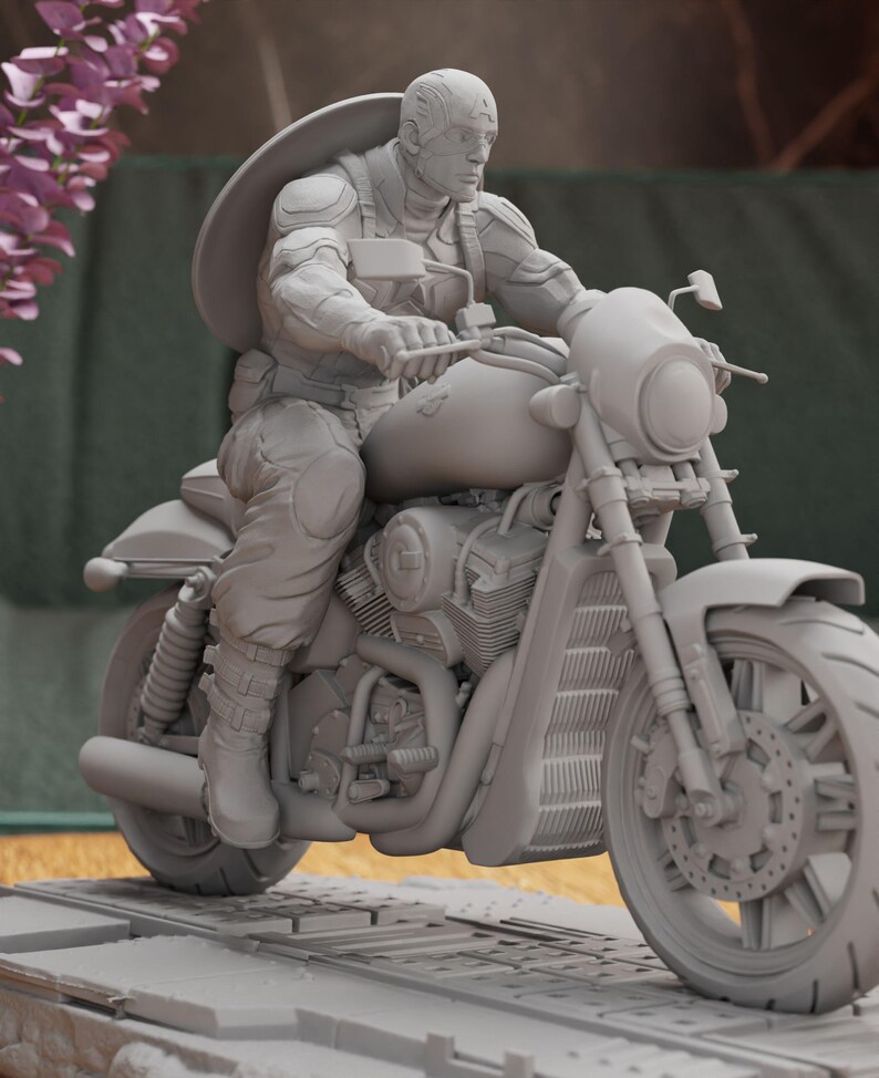 a statue of a man riding a motorcycle