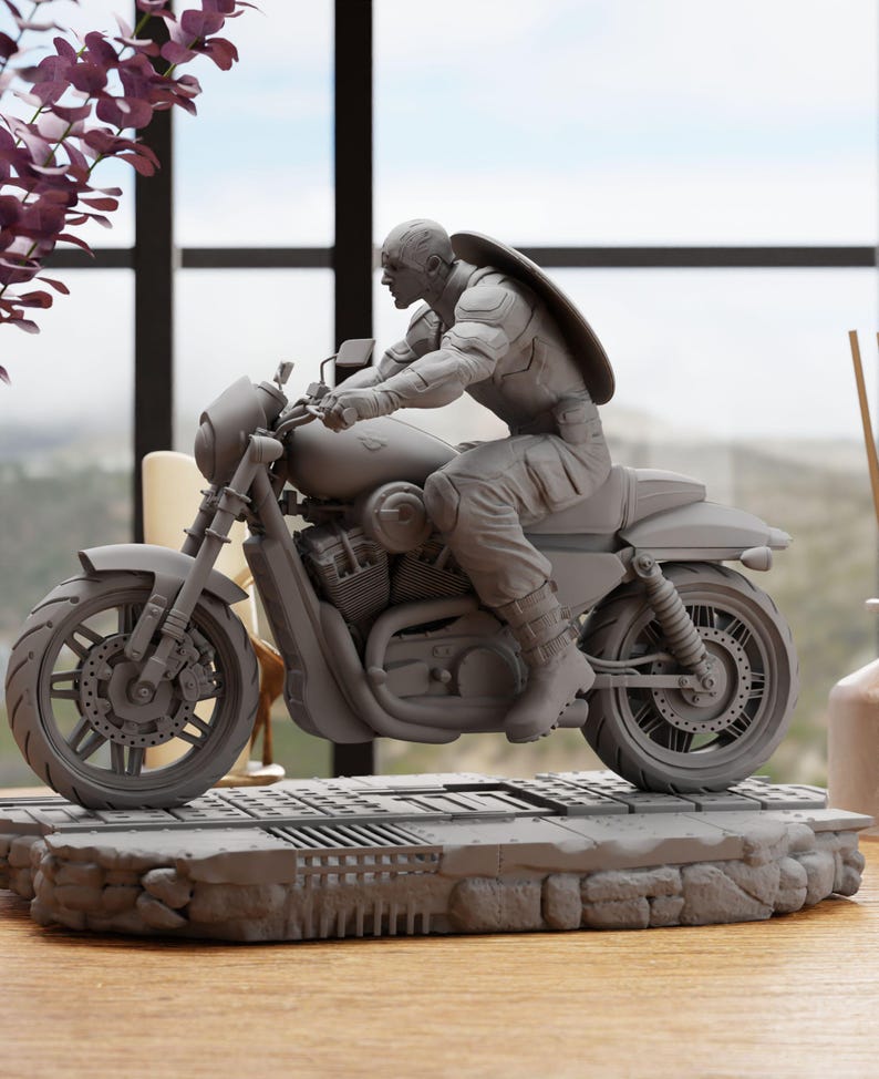 a statue of a man riding a motorcycle