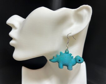 3D printed stegosaurus earrings