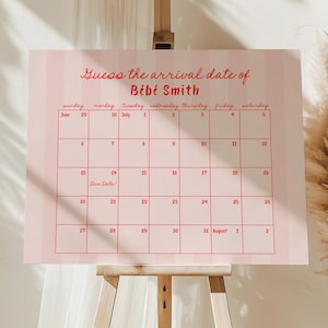 Op de afbeelding: Een roze en witte gestreepte kalender op een ezel met de tekst "Raad de aankomstdatum van Bébé Smith". Het kalenderraster is rood, met data van 29 juni tot 1 augustus. De woorden "Vervaldatum!" staan op de kalender.