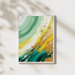 May include: Abstract painting with green, yellow, and gold swirls and splatters. The painting is framed in a white frame.