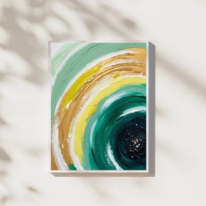 May include: Abstract painting with swirling green, yellow, and gold colors. The center of the painting is a dark green circle with white speckles.