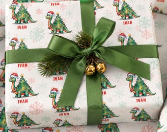 Papel de embrulho de Natal personalizado com dinossauro para meninos, com nome personalizado para crianças. Rolo de papel de embrulho de Natal com dinossauro fofo para crianças.