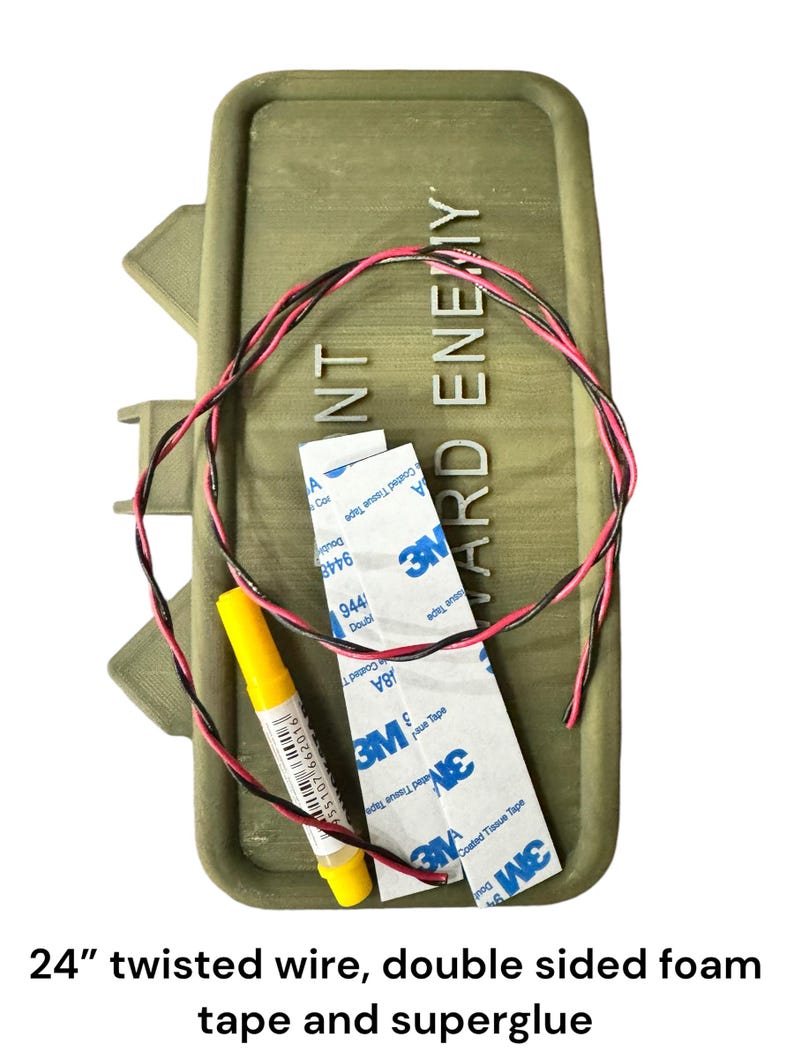 Claymore-style novelty prank sign kit with twisted wire and mounting accessories