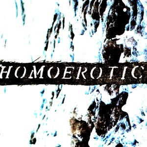 May include: The word "HOMOEROTIC" is displayed in white, stylized text on a dark, textured rectangular banner. The background features a blurred, abstract design with shades of white, blue, and black.