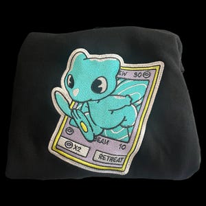Sudadera con capucha bordada de juego de cartas