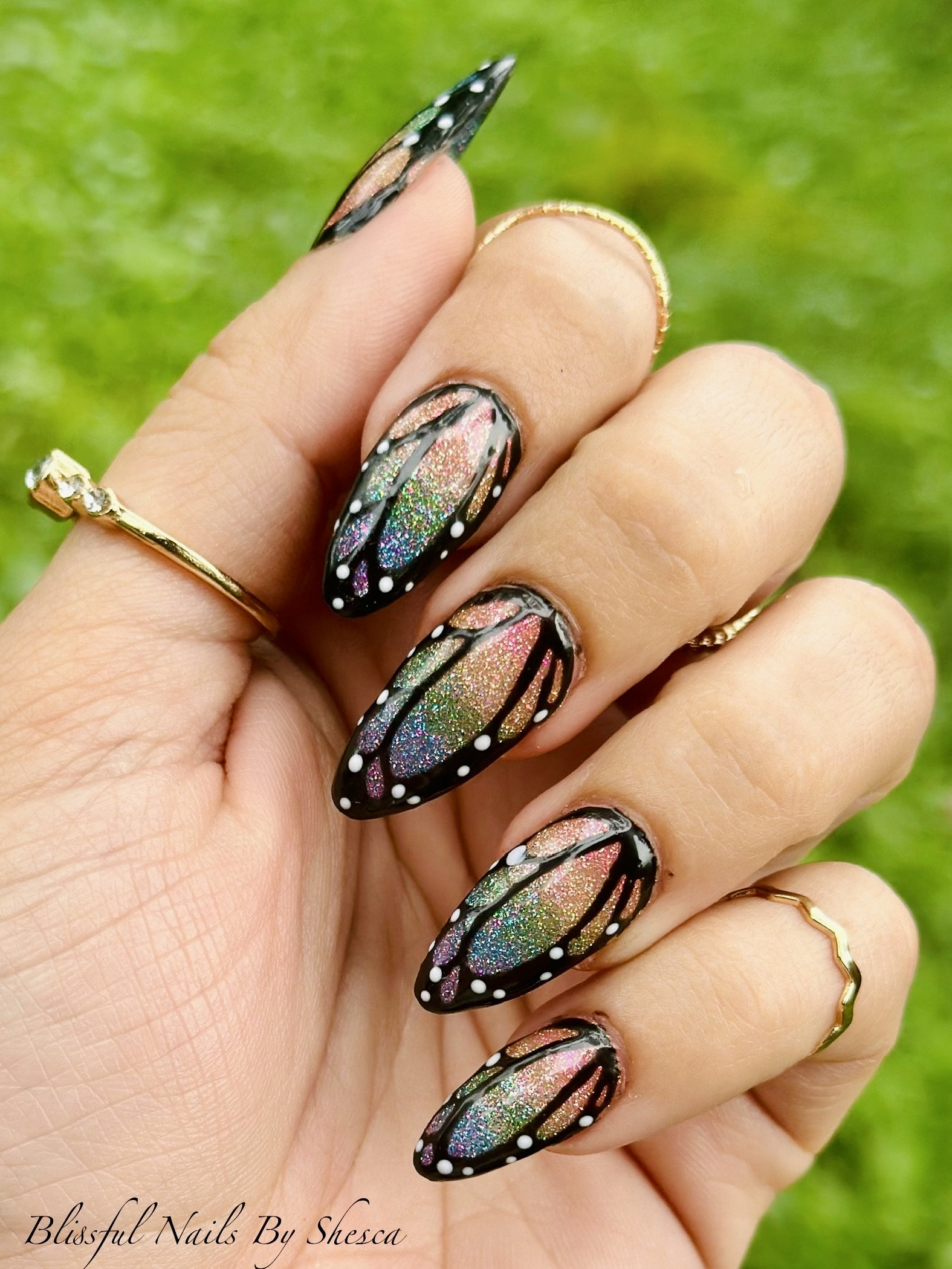 Abstract Butterfly Nails with Glitter Flair