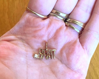 Vintage 10K gold plated novelty 90% brat charm with rhinestone