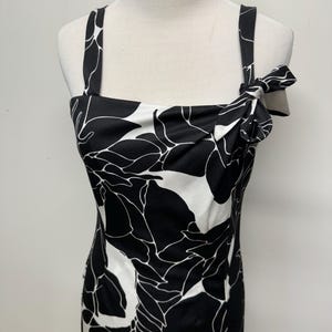 Vintage jaren 60/70 zwart-witte tropische bloemen Hawaiiaanse maxi-jurk grootschalige print flowerpower-stijl