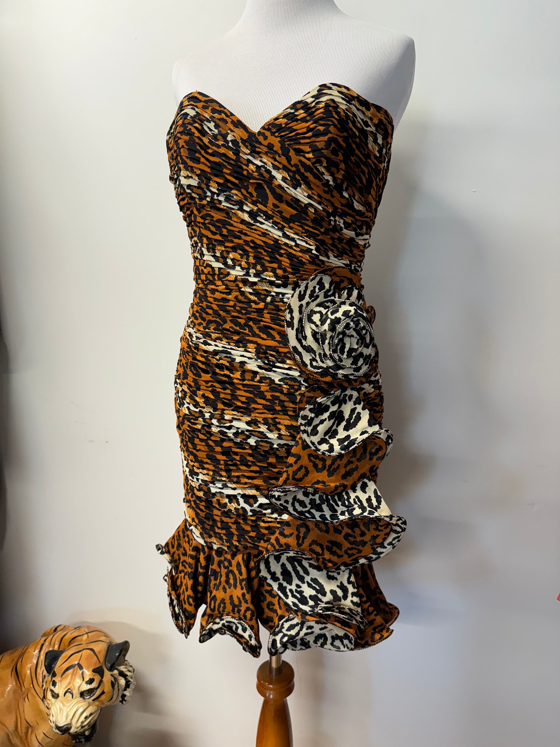 Vintage 80s 90s Lillie Rubin animal print mini dress with ruffles and rosettes sweetheart neckline
