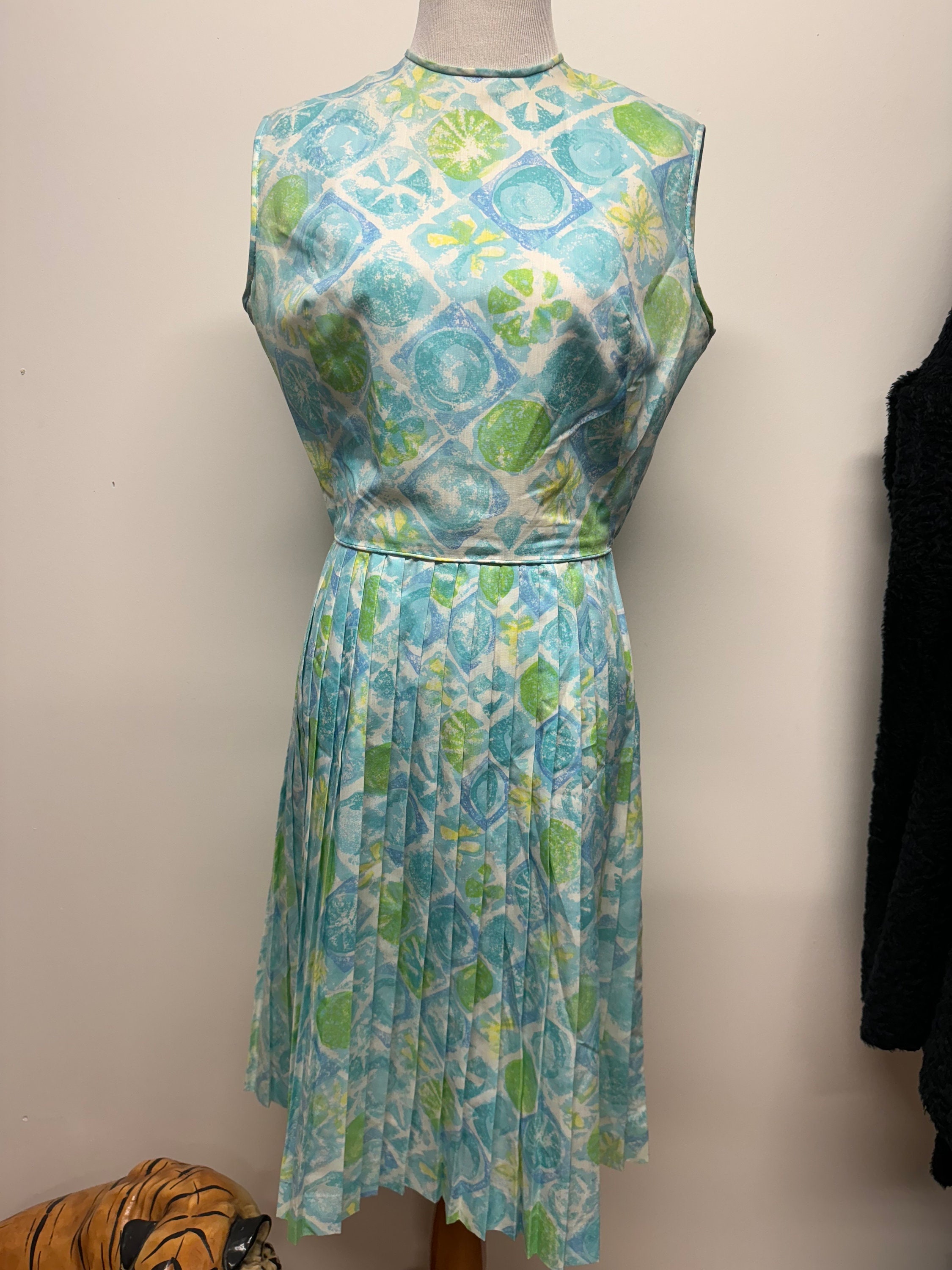 Vintage 50s 60s light blue green and yellow mad men style dress with full pleated skirt
