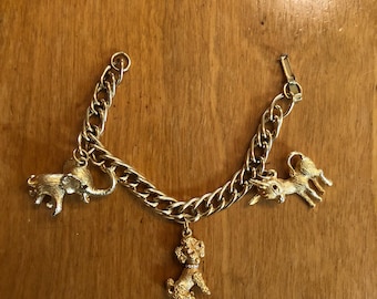 Vintage 50s Sarah Coventry charm bracelet with donkey poodle and elephant and rhinestones