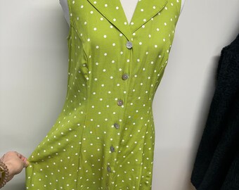 Vintage 90s Y2K lime green polka dot sun dress with criss-cross back detail and mother of pearl buttons
