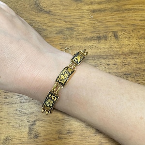 Vintage 50s 60s gold tone metal Damascene bracelet with flowers love birds doves floral design
