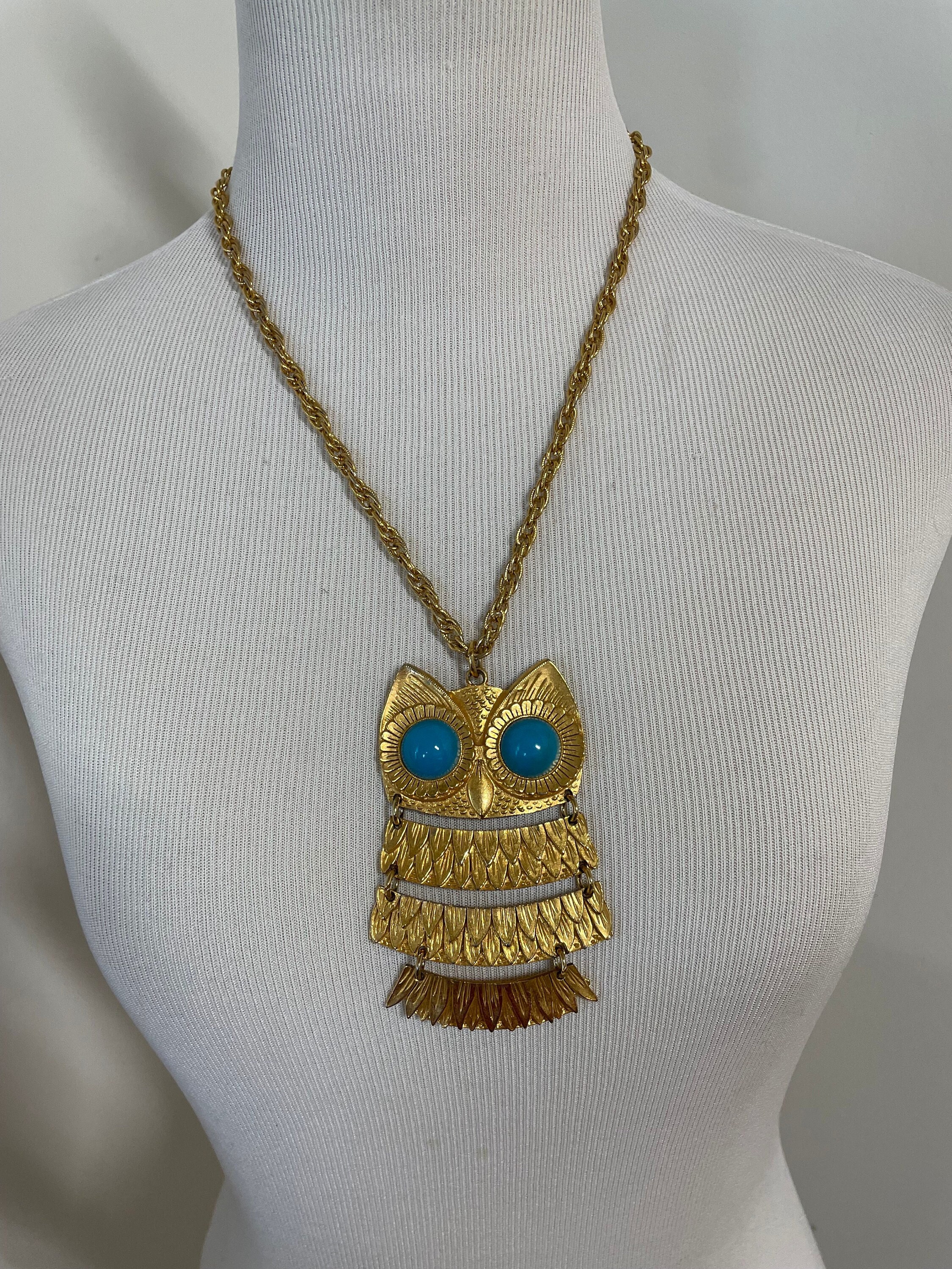 Vintage 60s gold articulated owl with turquoise cabochon eyes