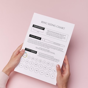 May include: A printable ring sizing chart with instructions on how to measure your finger for the perfect fit. The chart includes a paper sizing method and a method for measuring an existing ring. The chart shows ring sizes from 3 to 14.
