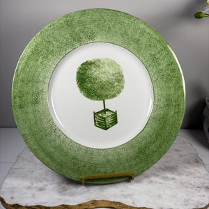 May include: A rustic wooden sign with the text "Welcome to our home" in white lettering. The sign features a distressed finish and a simple, inviting design, perfect for a front porch or entryway.