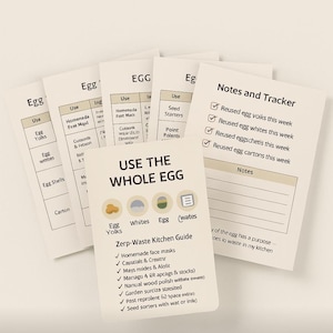 May include: A collection of cream-colored cards with text and illustrations related to egg usage. One card reads "USE THE WHOLE EGG" with a list of uses. Another card is a "Notes and Tracker" for tracking egg usage.