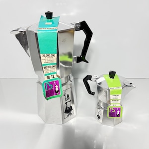 May include: A handmade wooden sign displaying the word "Welcome" in a whimsical, handwritten style. The white-painted sign has a distressed finish and a small heart detail. Suitable for indoor or outdoor display.