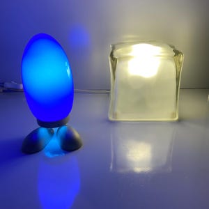 Pair of Vintage IKEA Lamps – Fjorton “Dino Egg” Cobalt Blue & Iviken “Ice Cube” Frosted Glass – 1990s Modern Design