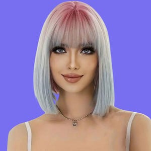 Multicolored short bob with bangs pink roots, blond and light blue ends
