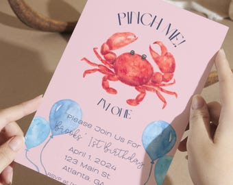 May include: Pink birthday invitation with a watercolor crab illustration and the text "PINCH ME! I'M ONE." Includes blue balloons and the text "Please Join Us For Brooks' 1st Birthday" with date, address, and RSVP information.