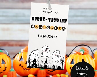May include: Printable Halloween gift tag with a white background and black text. The tag says "Have a Spook-tacular Halloween" with the word "Halloween" in orange circles. The tag also says "From: Finley" and has a black and white illustration of three ghosts and a spooky town.