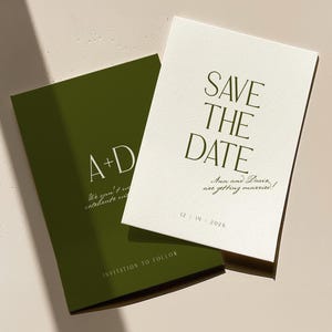 May include: Two wedding announcement cards. One is olive green with the initials "A+D" and the text "Invitation to Follow". The other is off-white with the text "Save the Date" and the names "Ana and Davis" with the date "12/19/2026".
