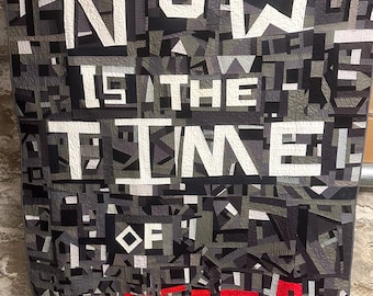 Edredón de protesta: Ahora es el tiempo de los monstruos, arte de patchwork político