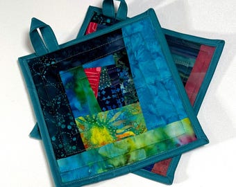 Agarraderas de tela acolchada batik con patchwork colorido