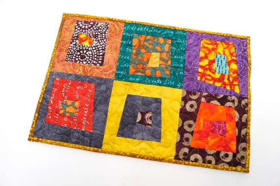 Quilted Patchwork Placemat, Wall Hanging or Table Topper in Bright and Colorful Batik Fabrics