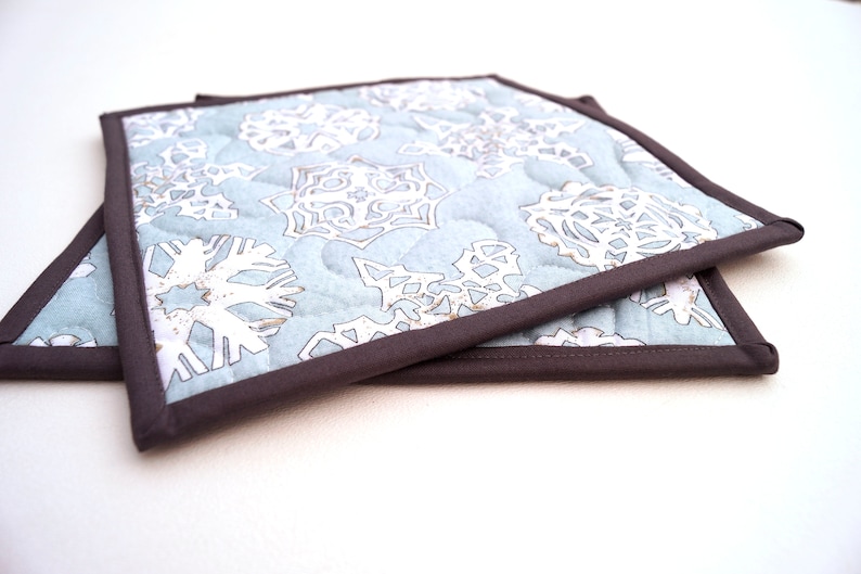 Snowflake Print Quilted Fabric Pot Holders in Light Blue Choice of One or Two with Hanging Tab Option