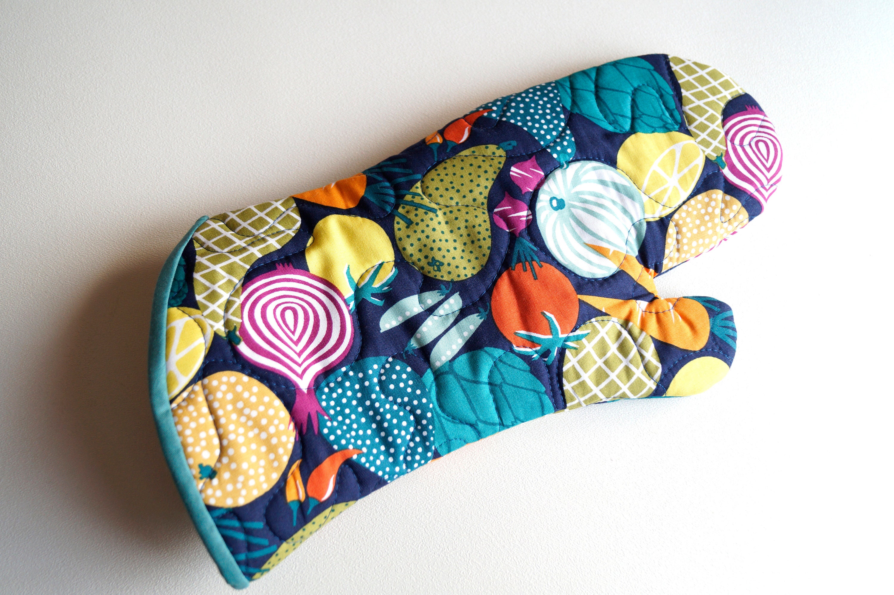 Quilted Fabric Oven Mitt with Colorful, Retro Fruit and Vegetable Pattern