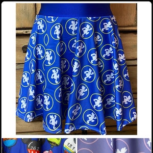 Magical running skirts with or without shorts attached for disney races Running RunDisney tech fabric donald daisy mickey mile markers women